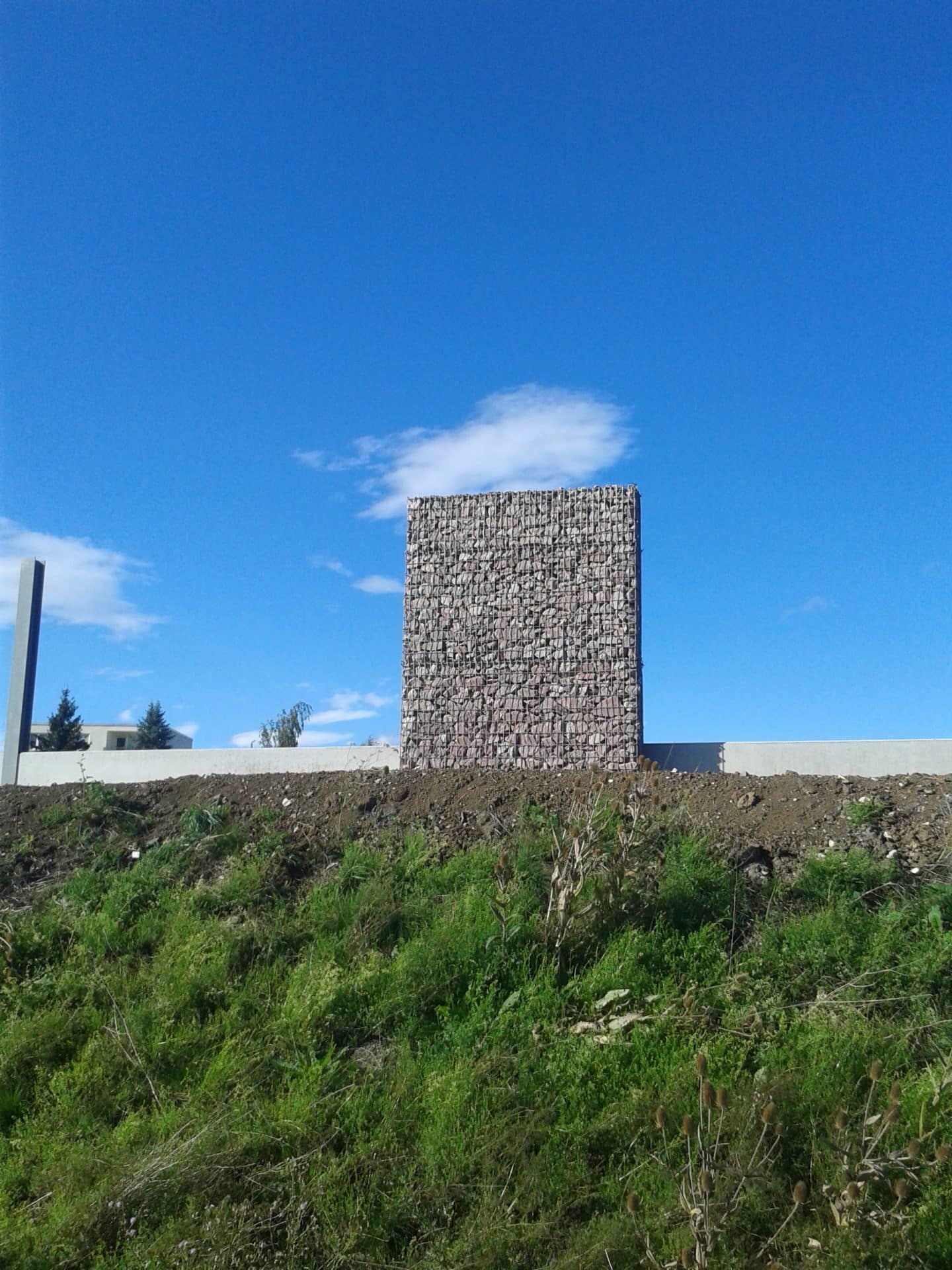 Vorsatzgabione auf Wall